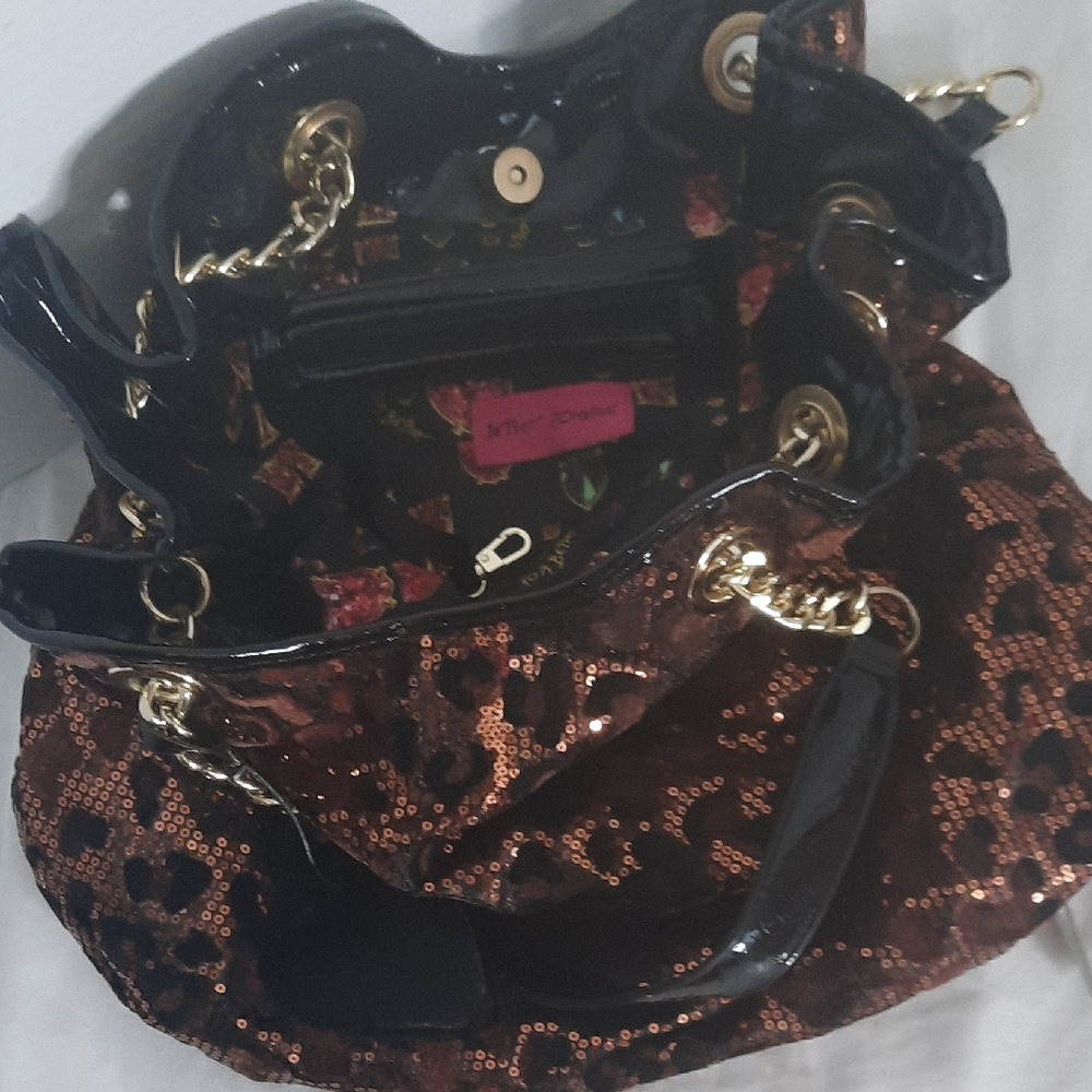 Elegant Brown and Black Shoulder Bags with Metallic Accents
